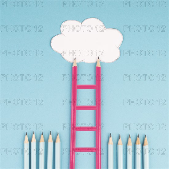 Ladder of success build with pencils, opportunity strategy, blue background, copy space for text,