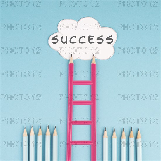 Ladder of success build with pencils, opportunity strategy, blue background, copy space for text,