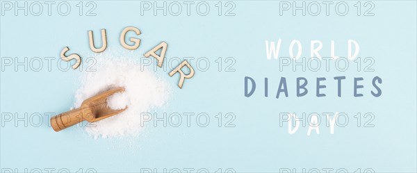 Shovel with white refined sugar, world diabetes day, insulin resistent, unhealthy food, addiction