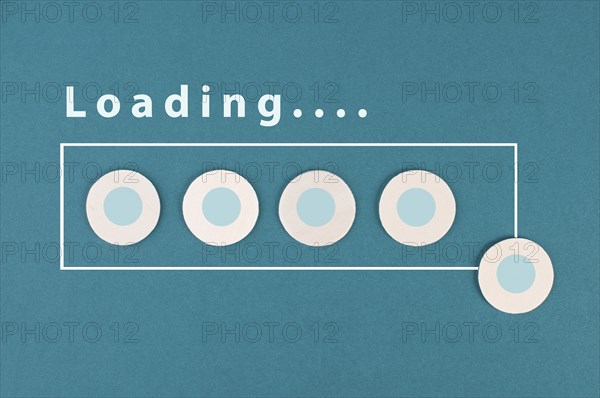 The word loading is standing over the progress bar, hand puts last cube to the row, business,