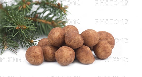 Marzipan potatoes, in german called Marzipankartoffeln, with cacao powder, sweets for christmas,