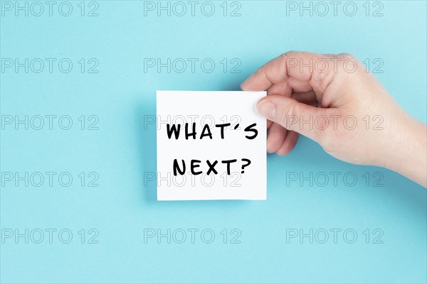 The phrase whatÂ´s next is standing on a cloud shaped paper, having new goals and strategies,