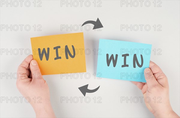 The word win is standing on paper, problem solving, winner mindset, business and education concept,