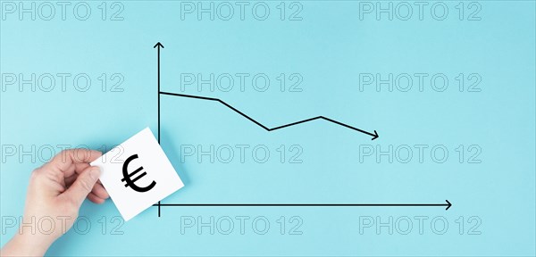 Inflation of the Euro currency, increase of prices and living costs, arrow shows down, financial