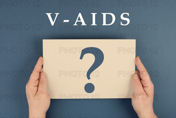 The word v-aids is standing on a paper, new autoimmune disease caused by covid-19 vaccination,