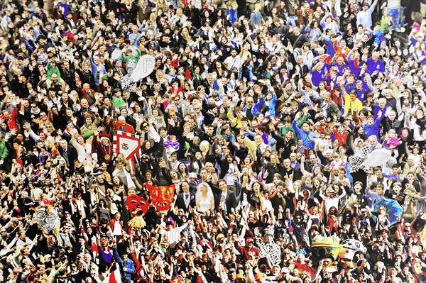 Volterra, Tuscany, Italy, Europe, Large crowd at a festive event, colourful clothes, cheerful