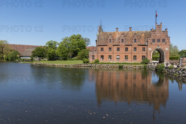 Gatehouse to Egeskov moated castle, KvÃ¦rndrup near Svenborg, Svendburg, reflection, museum