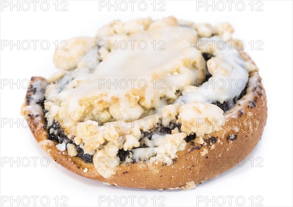 Poppyseed Cake isolated on pure white background (close-up shot)
