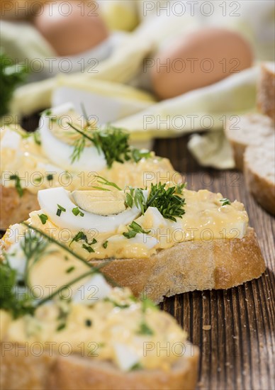 Portion of fresh homemade Egg Salad with fresh herbs