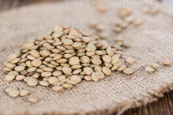 Portion of brown Lentils (detailed close-up shot)