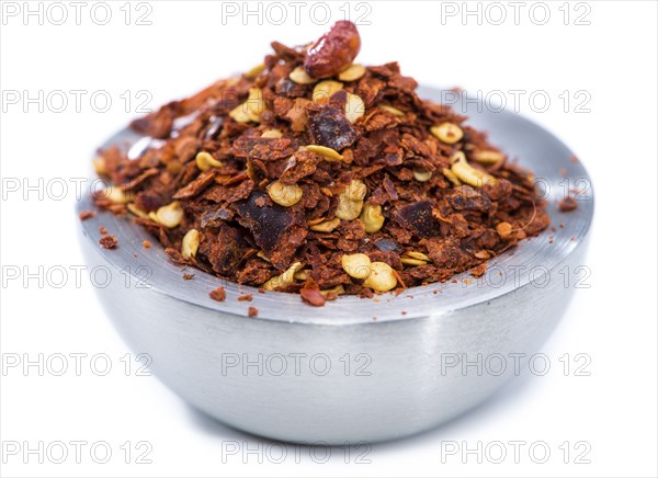 Chilli Spice in a small Bowl isolated on white background