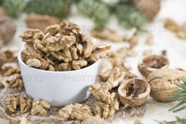 Heap of fresh Walnuts (close-up shot)
