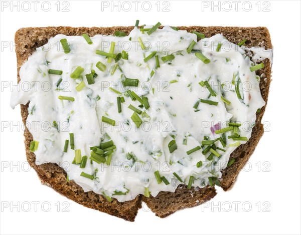 Slice of Bread with Herb Curd isolated on white background