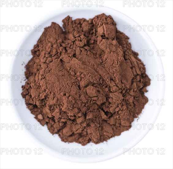Portion of Cocoa powder (selective focus) as detailed close-up shot isoalted on white background