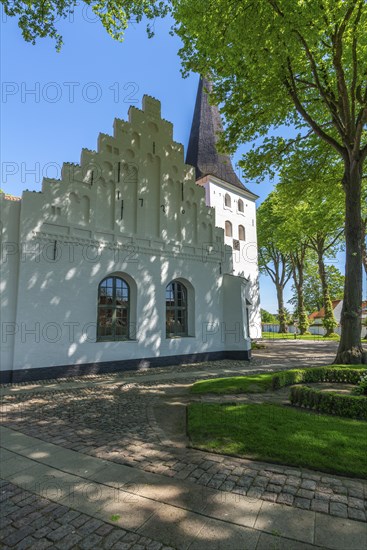 Bogense on the Kattegat, St Nicolas Church, Danish architecture, stepped gables, group of trees,