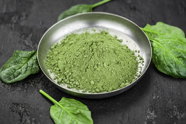 Freshly made green spinach powder (detailed close up shot, selective focus)