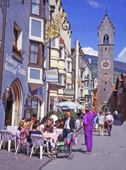 Main street with bell tower in Vipiteno, Sterzing, in the region of Trentino-Alto-Adige, South