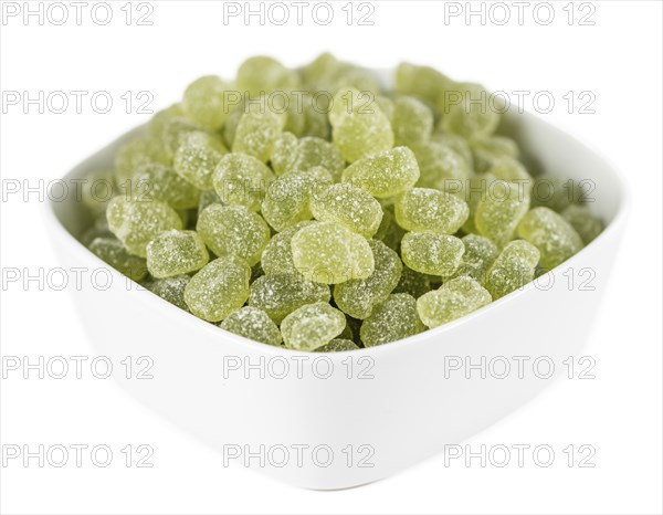 Sour gummy candy isolated on white background (close-up shot)