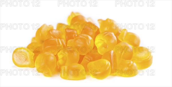 Gummy Peaches (close-up shot) isolated on white background