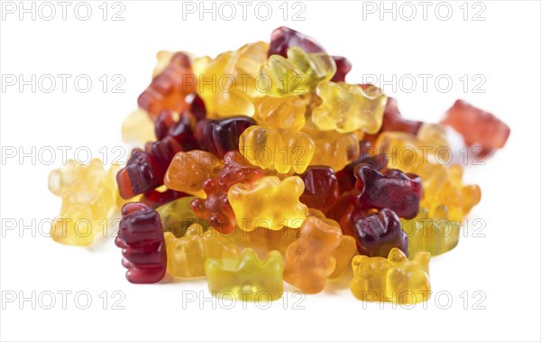 Heap of Gummy Bears (close-up shot) isolated on white background