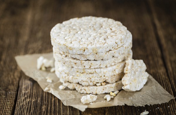 Old wooden table with Rice Cakes (detailed close-up shot)