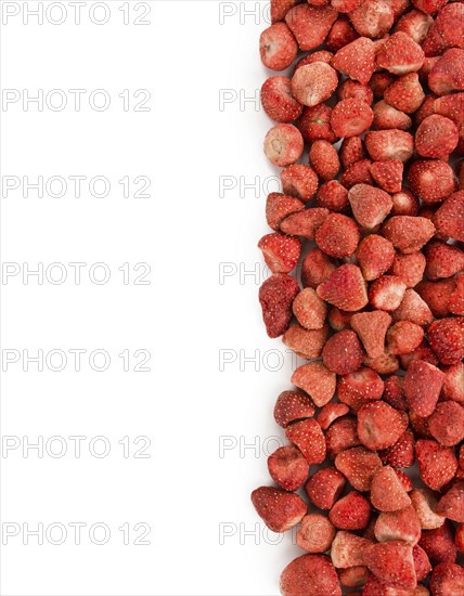 Fresh made Strawberries (dried) isolated on white background, close-up shot