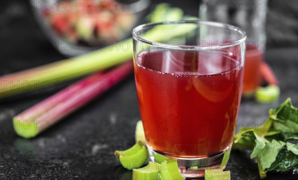 Homemade Rhubarb Spritzer as detailed close up shot (selective focus)