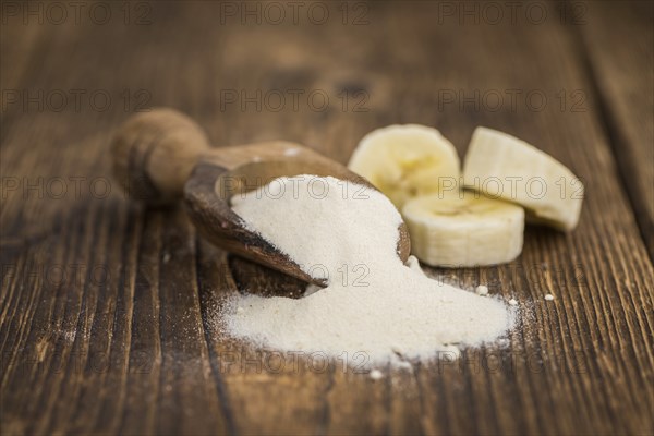 Portion of fresh Banana Powder close-up shot, selective focus