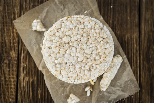 Some Rice Cakes on an old wooden background (detailed close-up shot)