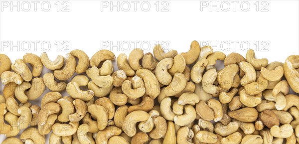 Cashew Nuts isolated on white background (close up shot, selective focus)