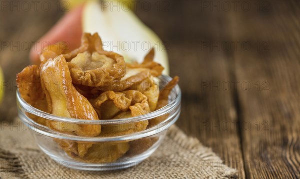 Dried Pears (selective focus) on an old wooden table