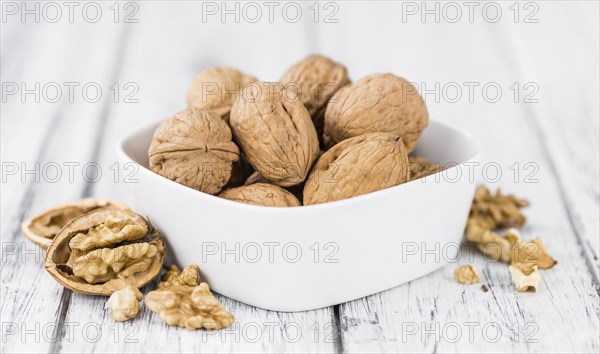 Portion of fresh Walnuts (close-up shot, selective focus)