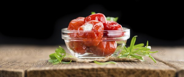 Homemade Filled Pimientos on vintage background (selective focus, close-up shot)