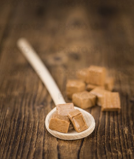 Portion of fresh Caramel (close-up shot, selective focus)