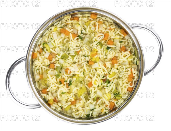Homemade Alphabet Soup (selective focus) isolated on white background