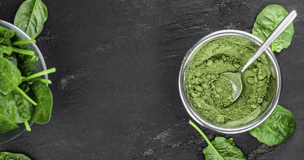 Homemade green spinach powder (close up shot, selective focus)