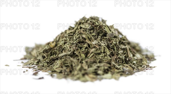 Dried Stevia leaves isolated on white background (close-up shot)