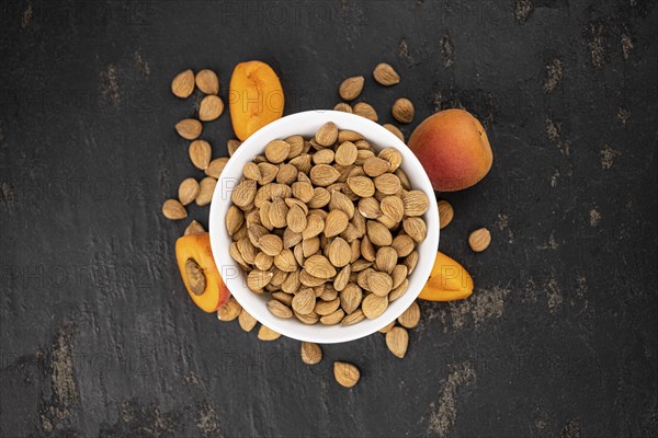 Some shelled Apricot Kernels as detailed close up shot (selective focus)