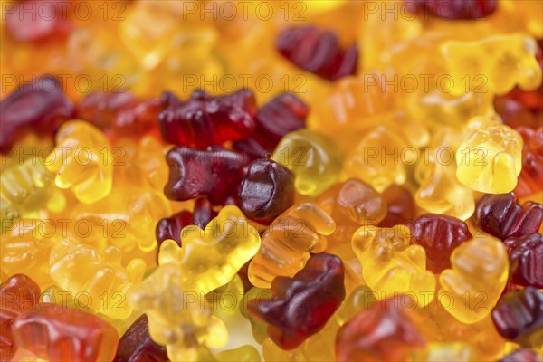 Heap of Gummy Bears (close-up shot, selective focus) for use as background image or as texture