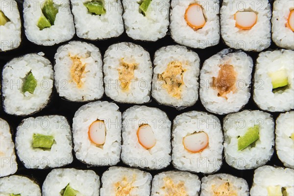 Fresh made Sushi (selective focus) on a vintage looking slate slab