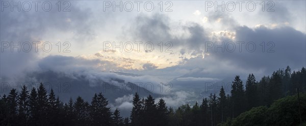 Evening clouds and fog over the Liesingtal, in the valley the village Traboch, Schoberpass federal