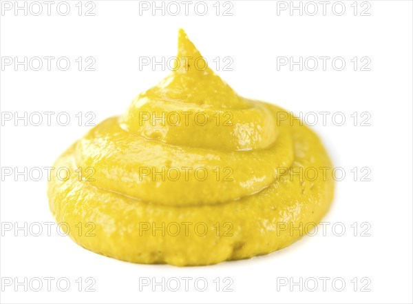 Portion of Mustard (as close-up shot) isolated on white background