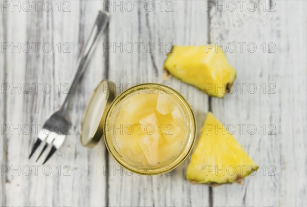 Portion of fresh Preserved Pineapple pieces close-up shot, selective focus