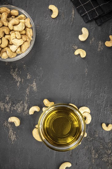 Fresh made Cashew Oil (detailed close up shot, selective focus)