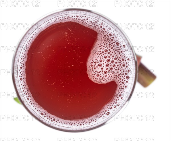 Fresh made Rhubarb Spritzer isolated on white background (close up, selective focus)