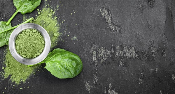 Freshly made green spinach powder (detailed close up shot, selective focus)