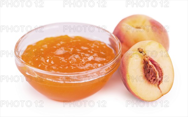 Portion of Peach Jam on a rustic slate slab, selective focus, close-up shot