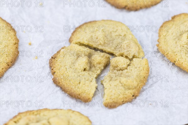Vintage wooden table with Cookies (selective focus, close-up shot)