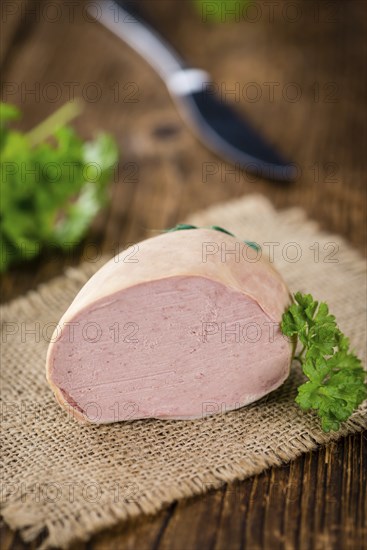 Portion of fresh made Liverwurst (close-up shot, selective focus)