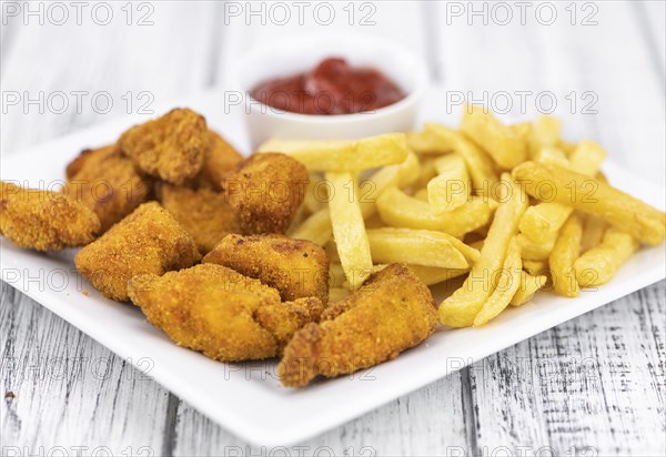 Chicken Nuggets as detailed close-up shot (selective focus)
